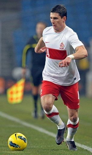Poland's Marcin Komorowski of Russian club Terek Grozny has been recalled for Tuesday's match